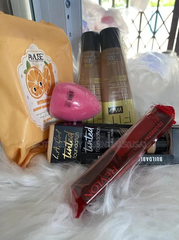 2 Different Brand Foundations,Revlon Lipstick ,Beauty Blender · Photo 1