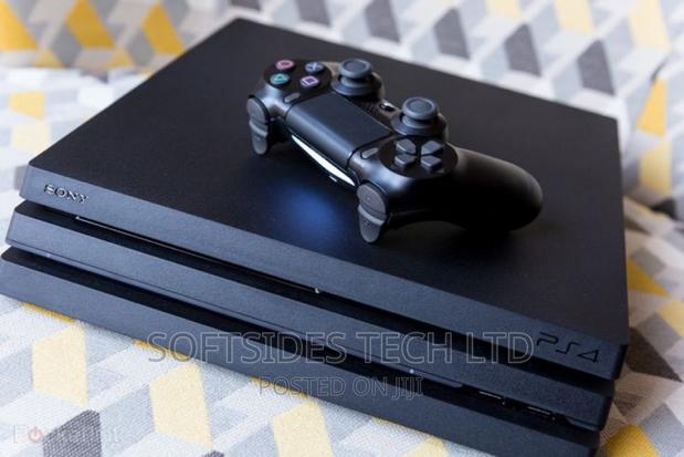 Playstation 4 Pro PS4 Pro Used Video Game Console · Photo 1