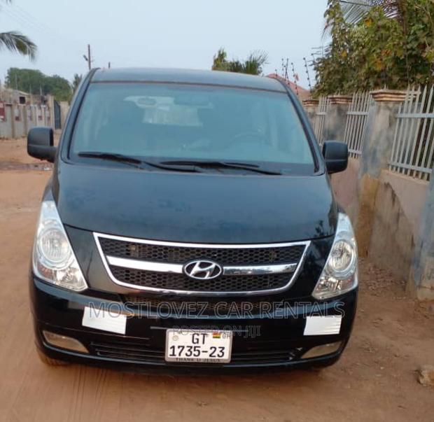 Car Rental in Ghana- Mini Black Vans for Rent- · Photo 1