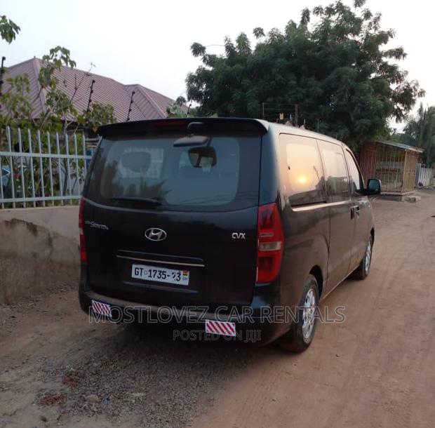 Car Rental in Ghana- Mini Black Vans for Rent- · Photo 2
