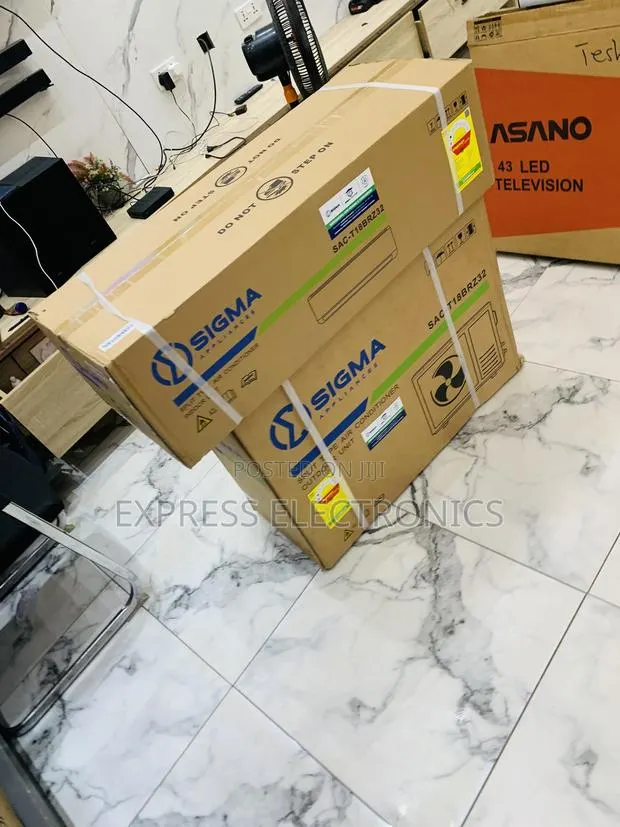 Available Now at Store White Sigma Air Conditioner 2.0hp · Photo 1