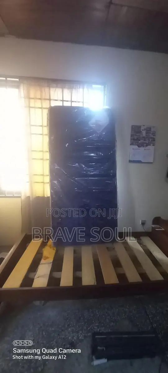 Wooden Bed · Photo 1