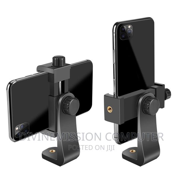 Phone Holder on Tripod With Adjustable Handle · Photo 1