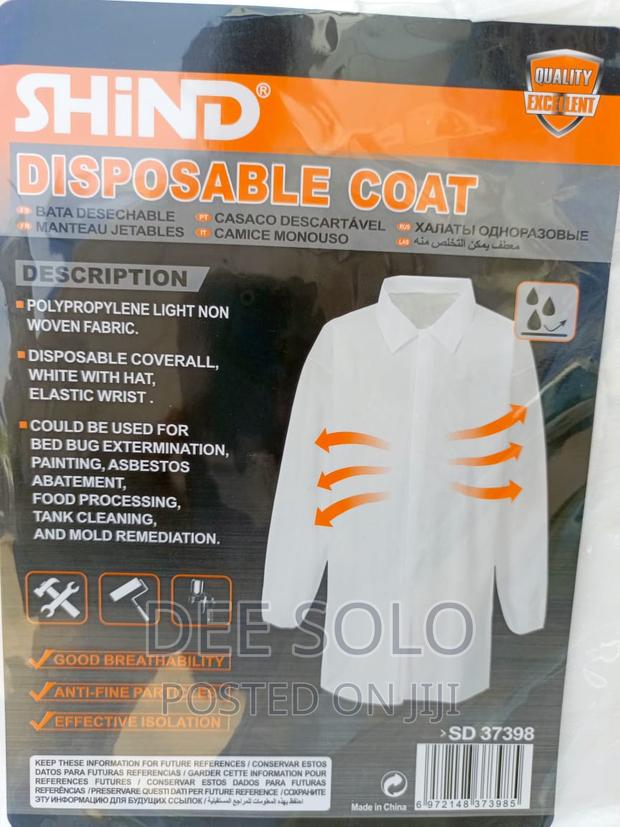 Disposable Lab Coats · Photo 1