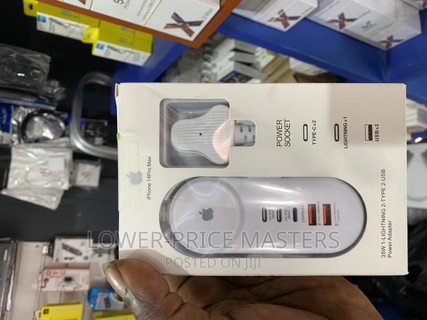 All in 1 Travel Power Adapter Charger · Photo 1