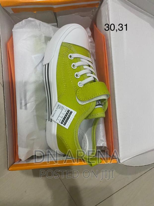 Kids All Stars Sneakers Neatly in a Box · Photo 4