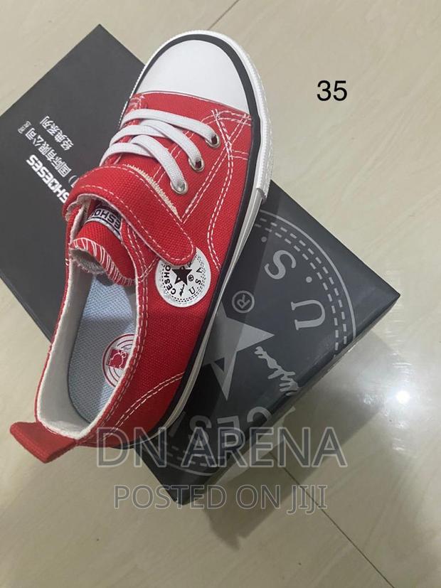Kids All Stars Sneakers Neatly in a Box · Photo 2