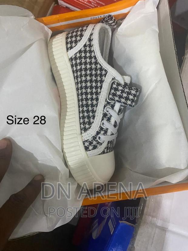 Kids All Stars Sneakers Neatly in a Box · Photo 3