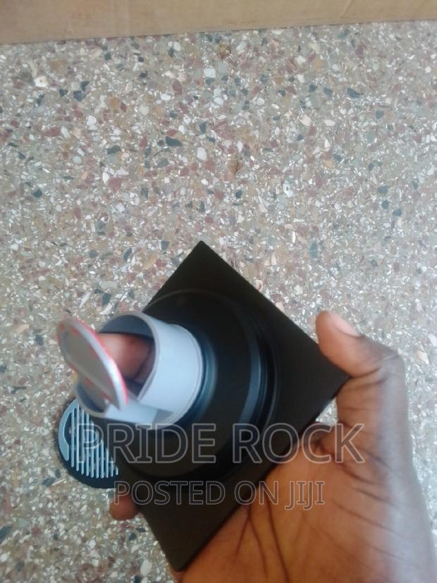 Black Metal Antitrust Floor Drain · Photo 2