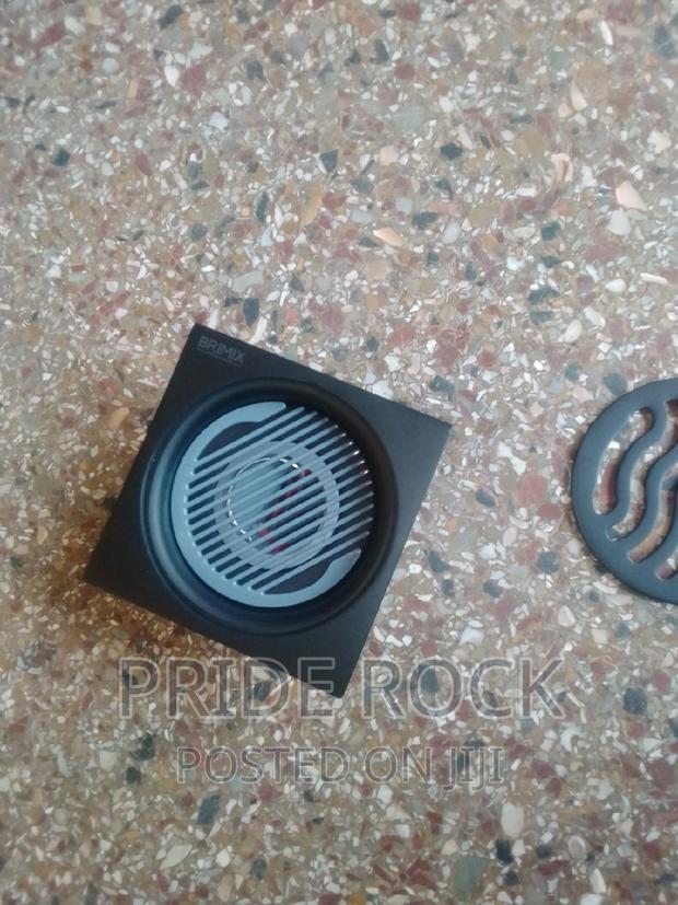 Black Metal Antitrust Floor Drain · Photo 3