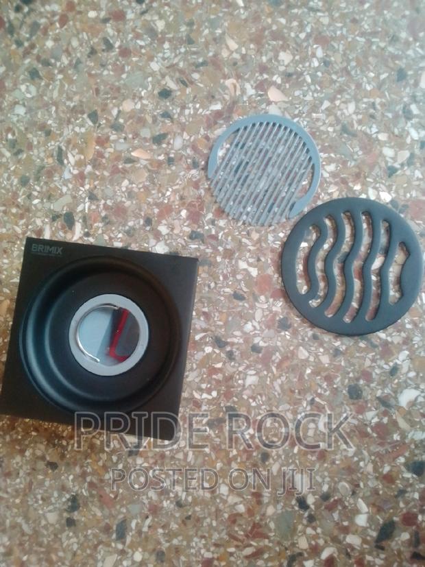 Black Metal Antitrust Floor Drain · Photo 5
