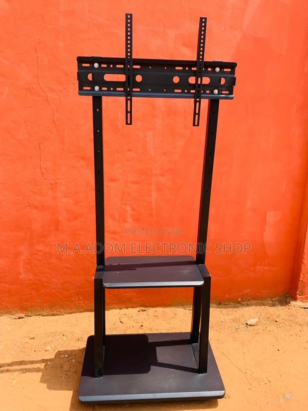 Brand New Mobile Tv Stand With Wheels for 32”-75” Tv · Photo 1