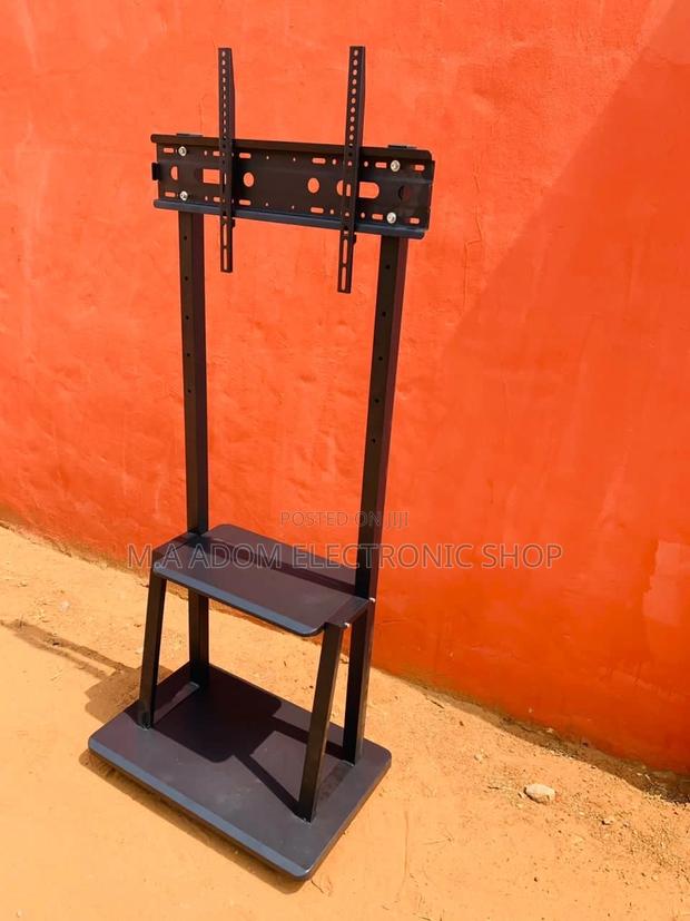 Stainless Steel Mobile Tv Stand With Wheels for 32”-75” Tv. · Photo 1