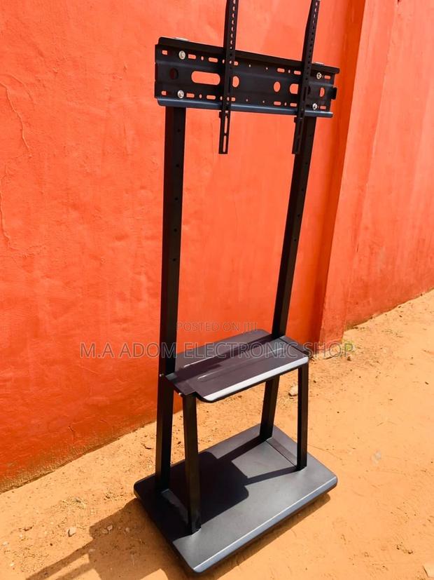 Anti-Rust Mobile Tv Stand With Wheels for 32” to 75” Tv · Photo 1
