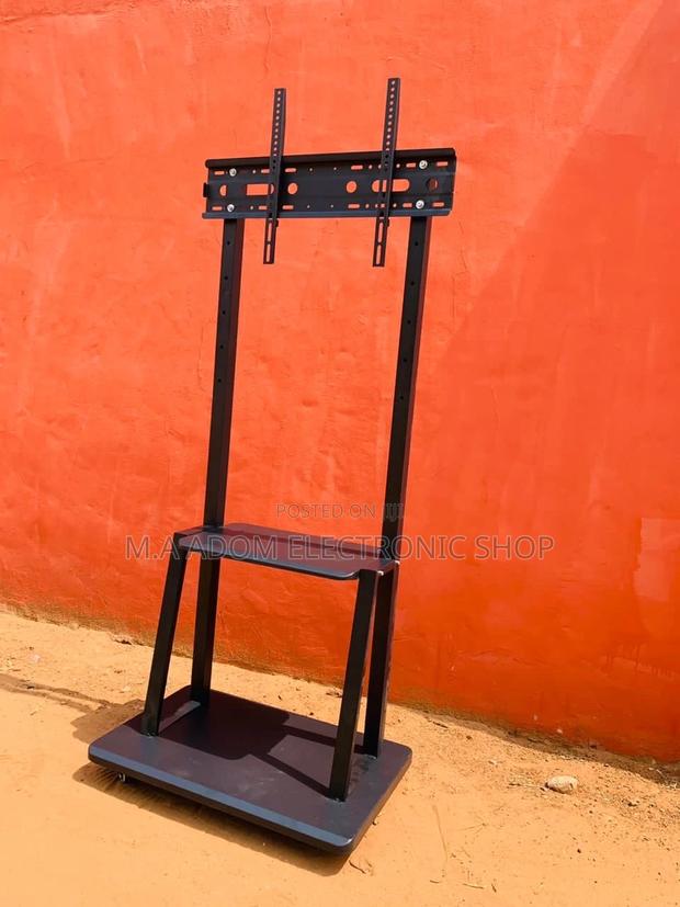 Fresh in Box Mobile Tv Stand With Wheels for 32”-75” Tv · Photo 1