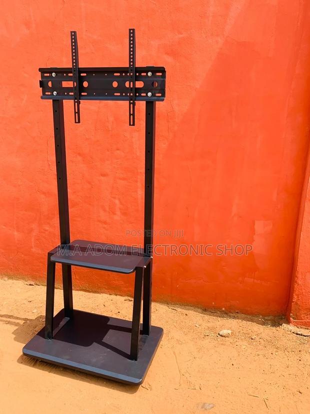 Newly in Stock Mobile Tv Stand With Wheels for 32”-75” Tv · Photo 1
