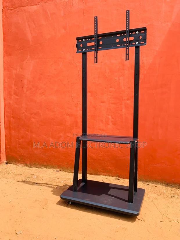 Quality Mobile Tv Stand With Wheels for 32”-75” Tv(Black). · Photo 1