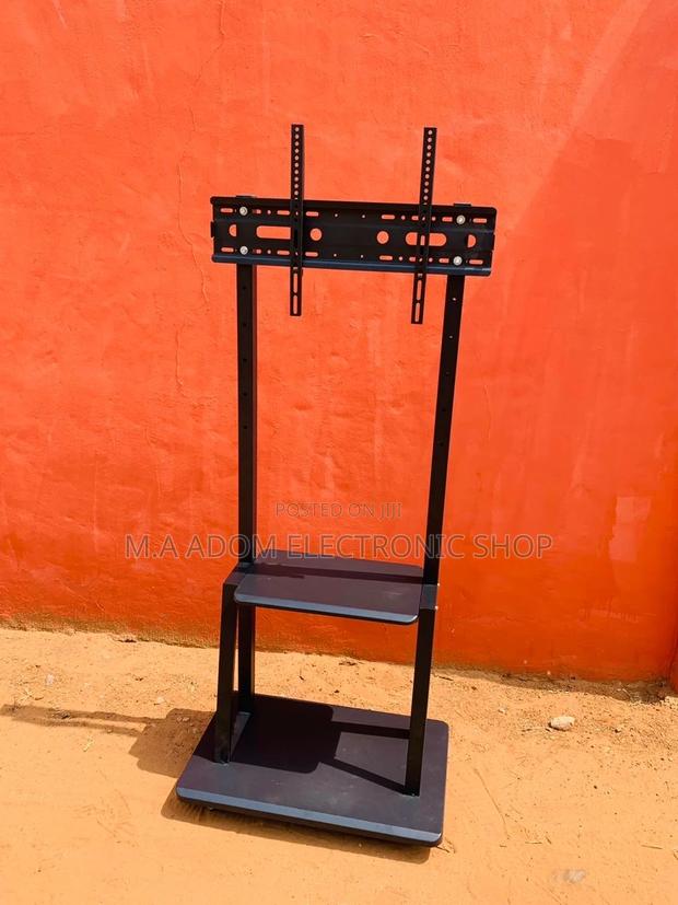 Mobile Tv Stand With Wheels for 32 Inch to 75” Tv · Photo 1