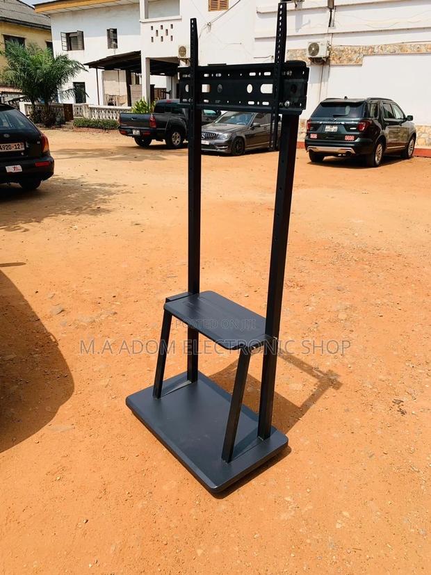 Latest and Affordable Mobile Tv Stand With Wheel for 32”-75” · Photo 1