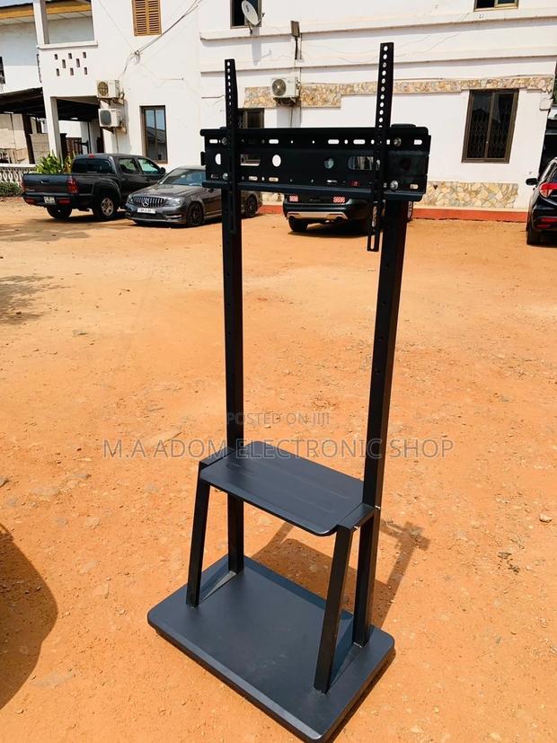 Authentic Mobile Tv Stand With Wheels for 32” to 75 Inch Tv. · Photo 1