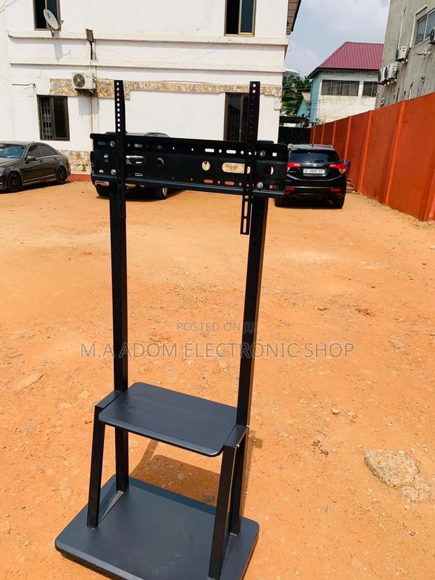 Shop Affordable Mobile Tv Stand With Wheels for 32”-75” Tv. · Photo 1