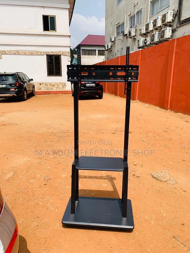 Shop Adorable Mobile Tv Stand With Wheels for 32”-75” Tv. · Photo 1
