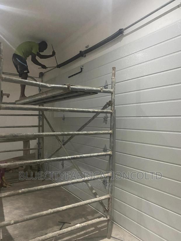 Car Automated Garage Door · Photo 3