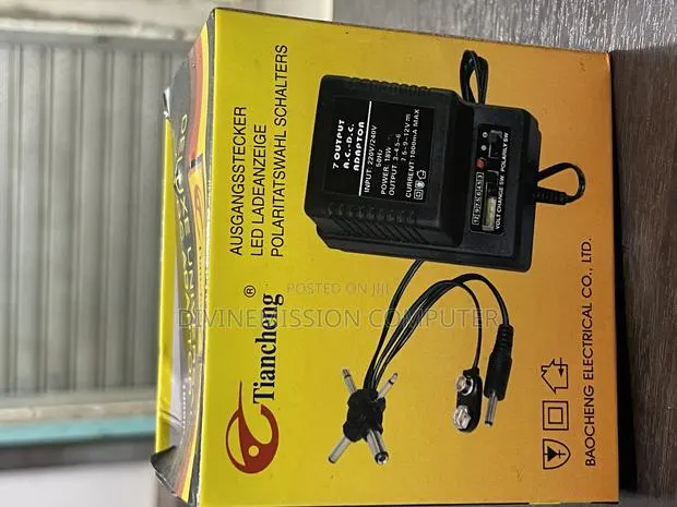 Deluxe Universal Ac/Dc Adapter 3v to 12v · Photo 1