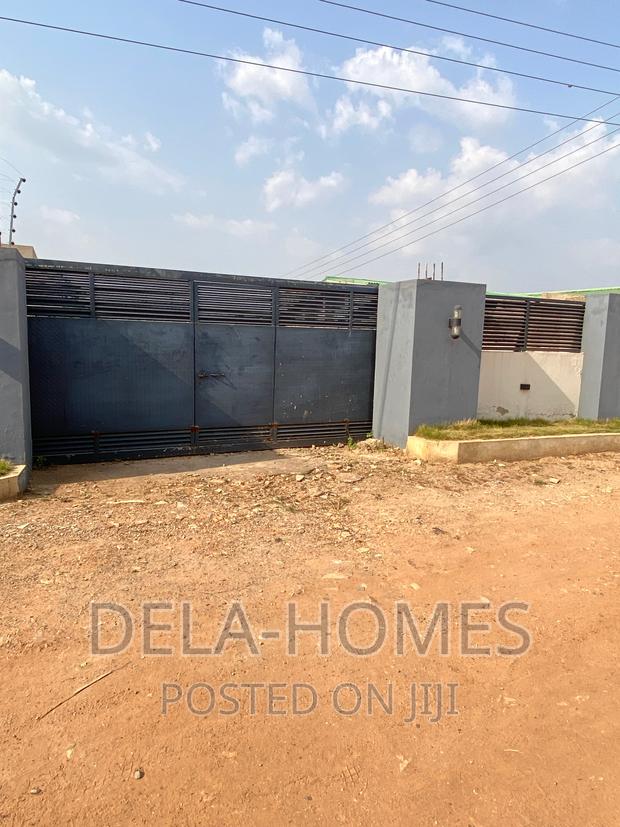 50/70 Wall N Gated,Titled Land for Sale at Oyarifa. · Photo 1