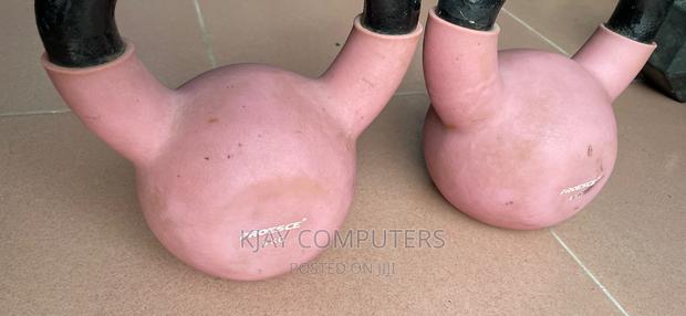 A Pair of 6 Kg Rubber Kettle Bells