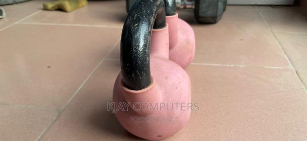 A Pair of 6 Kg Rubber Kettle Bells · Photo 3