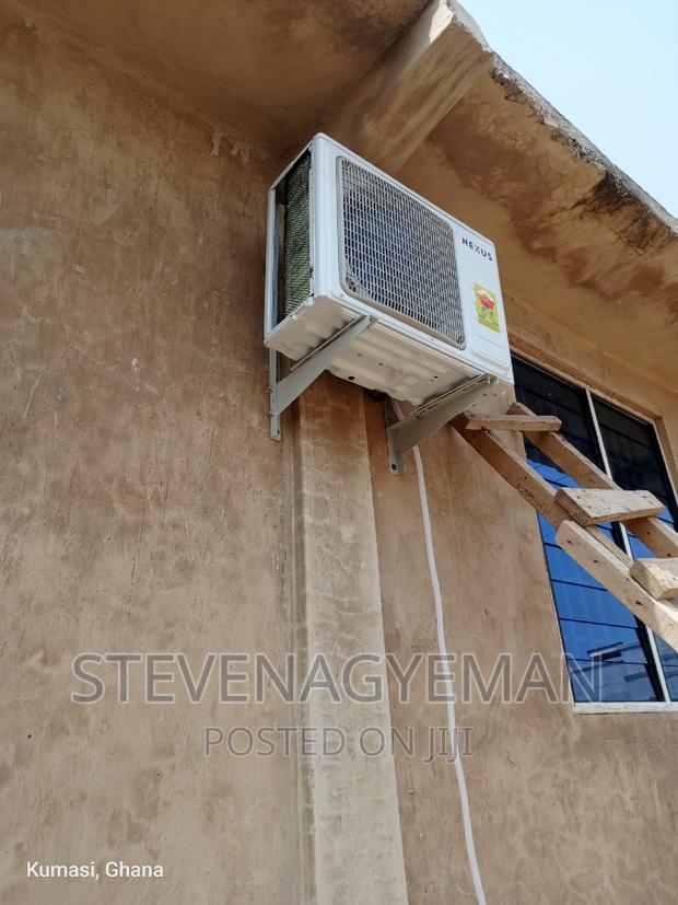 Installation of Air Conditioning · Photo 2
