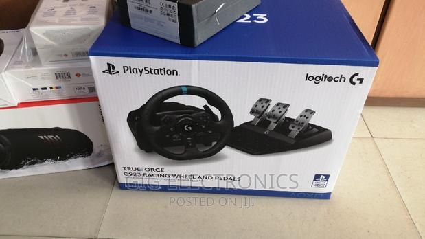Logitech G923 Racing Wheel and Pedals, Trueforce Up to 1000 · Photo 1