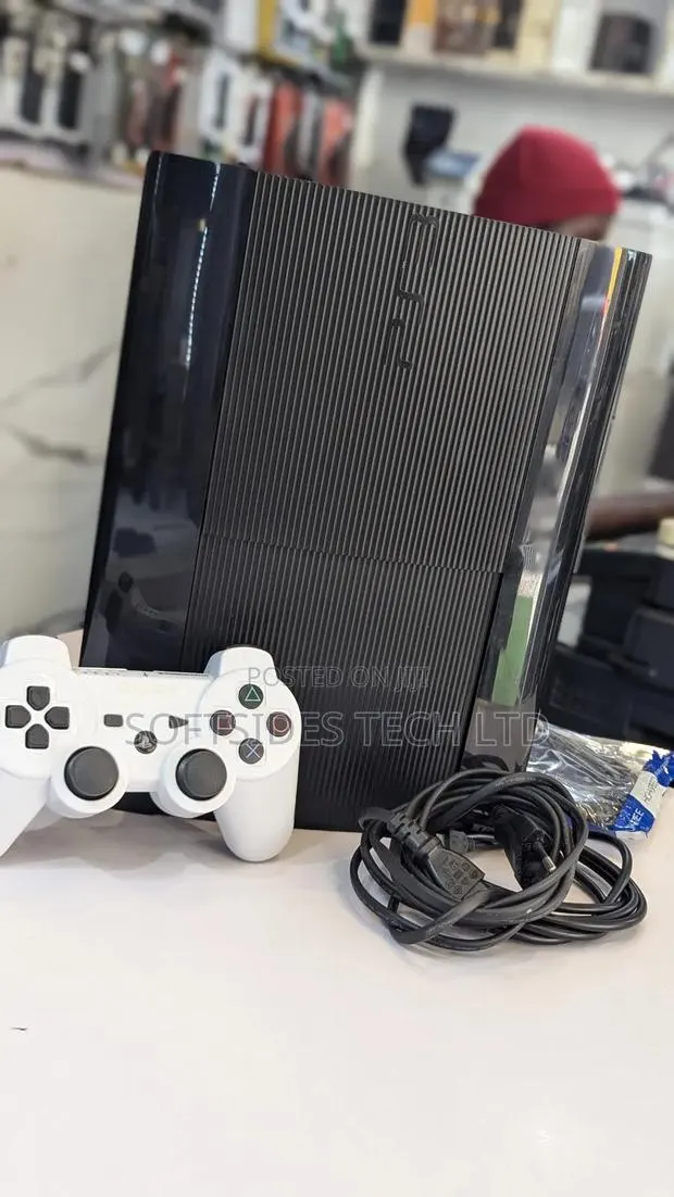 Black Nice Playstation 3 Slim With Ganes For Sale In Accra · Photo 1
