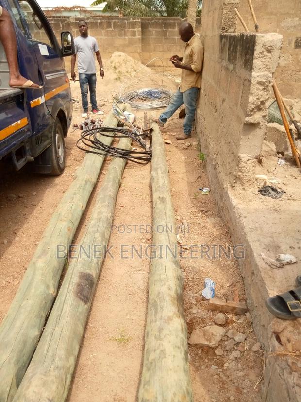 Installation of Electric Poles · Photo 1