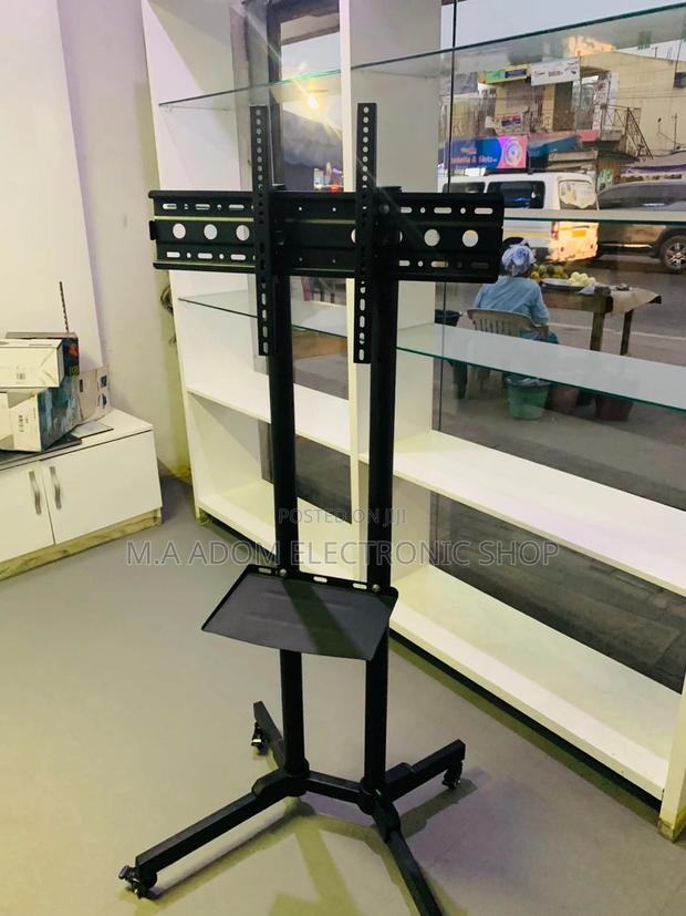 Classic Design Moveable Tv Trolly for 32 Inch to 65” Tv. · Photo 1