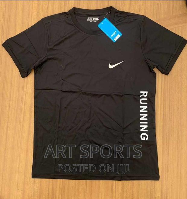 Nike Running Tops · Photo 2
