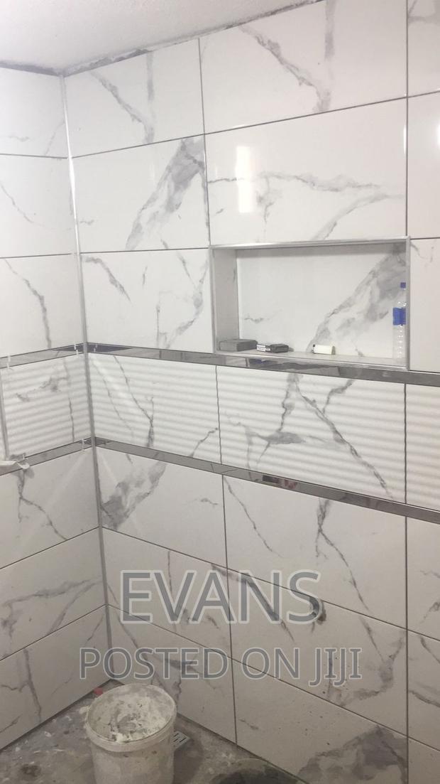 Wall Tilling Solutions · Photo 1