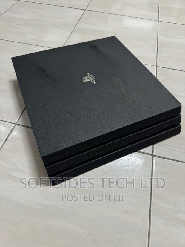 Home Used Playstation 4 Pro With Controller and 1tb Storage · Photo 2