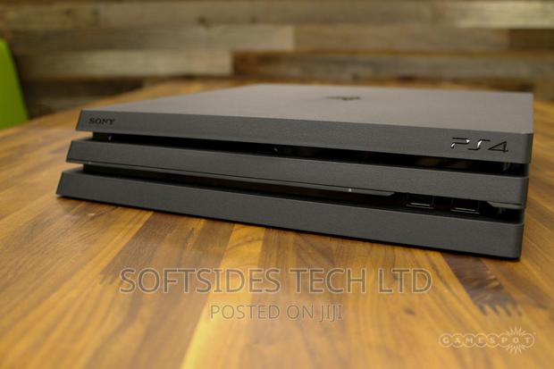 Sony Playstation 4 Pro 1tb With Controller and Accesories. · Photo 3