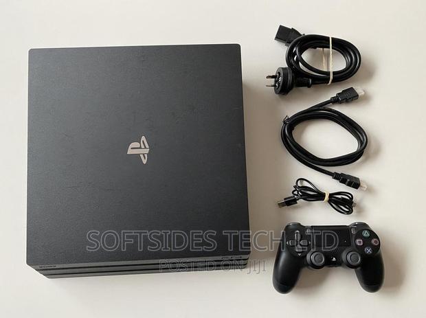 Sony Playstation 4 Pro 1tb With Controller and Accesories. · Photo 2