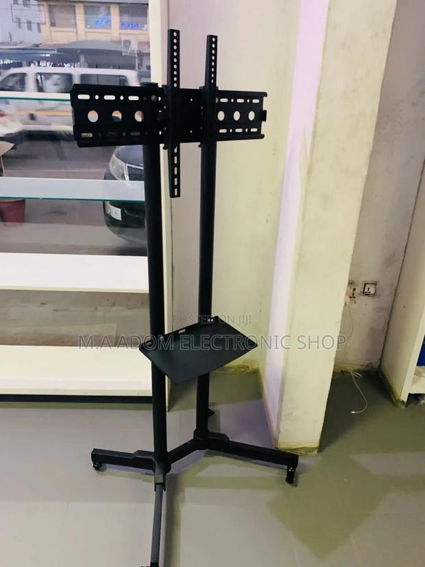 Purchase Quality Moveable Tv Stand for 32”-65”. · Photo 1