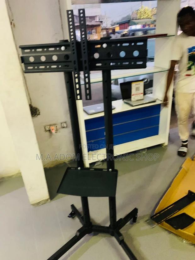 Purchase Authentic Moveable Tv Trolly for 32”-65 Inches. · Photo 1