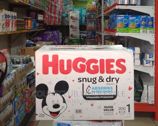 HUGGIES Snug Dry Diapers Size1 200count · Photo 1