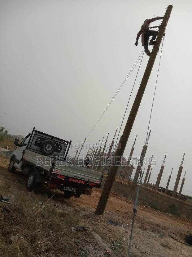 Pole Extension and Service Lines · Photo 1
