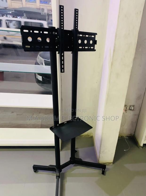 Shop Quality Moveable Tv Trolly for 32” to 65 Inch(Black). · Photo 1