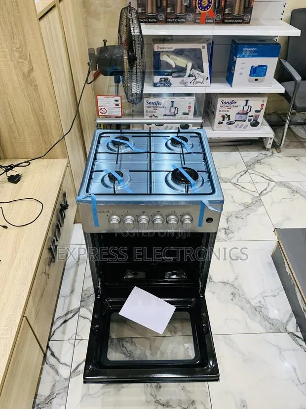 Less Expensive Gas Cooker Oven 4burner 50/50 · Photo 1