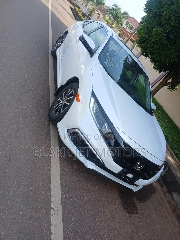 Honda Civic Touring Coupe 2020 White · Photo 1