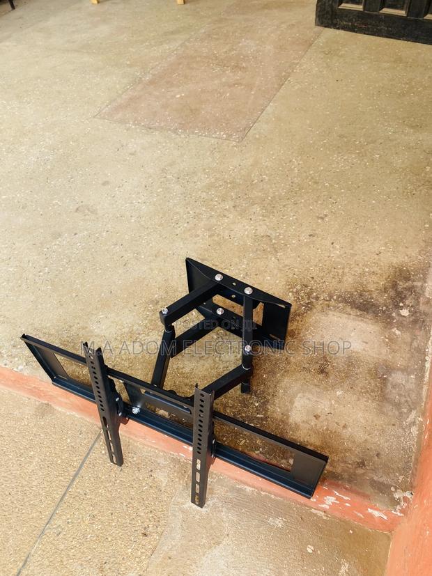 Brand New Wall Mount for 32”-75 Inch Tv,Black. · Photo 1