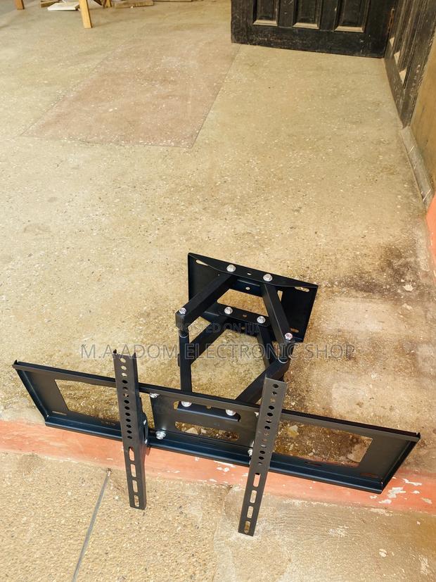 Elegant Black Wall Mount for 32”-75 Inch Tv. · Photo 1